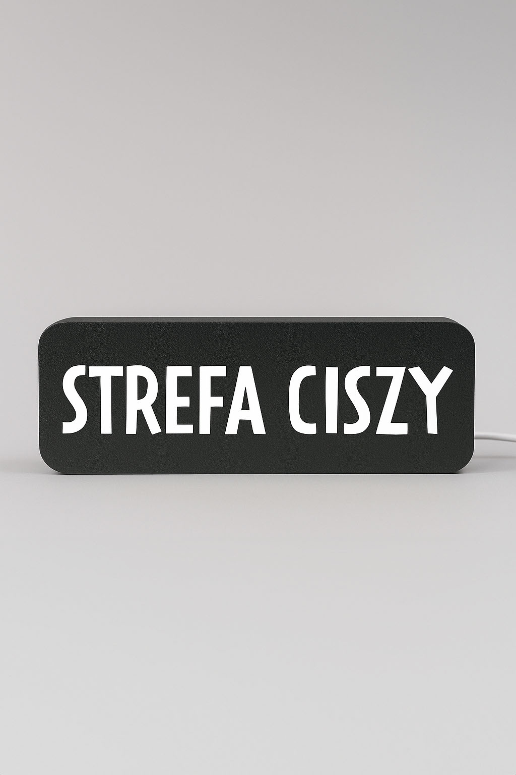 Lampa z napisem STREFA CISZY