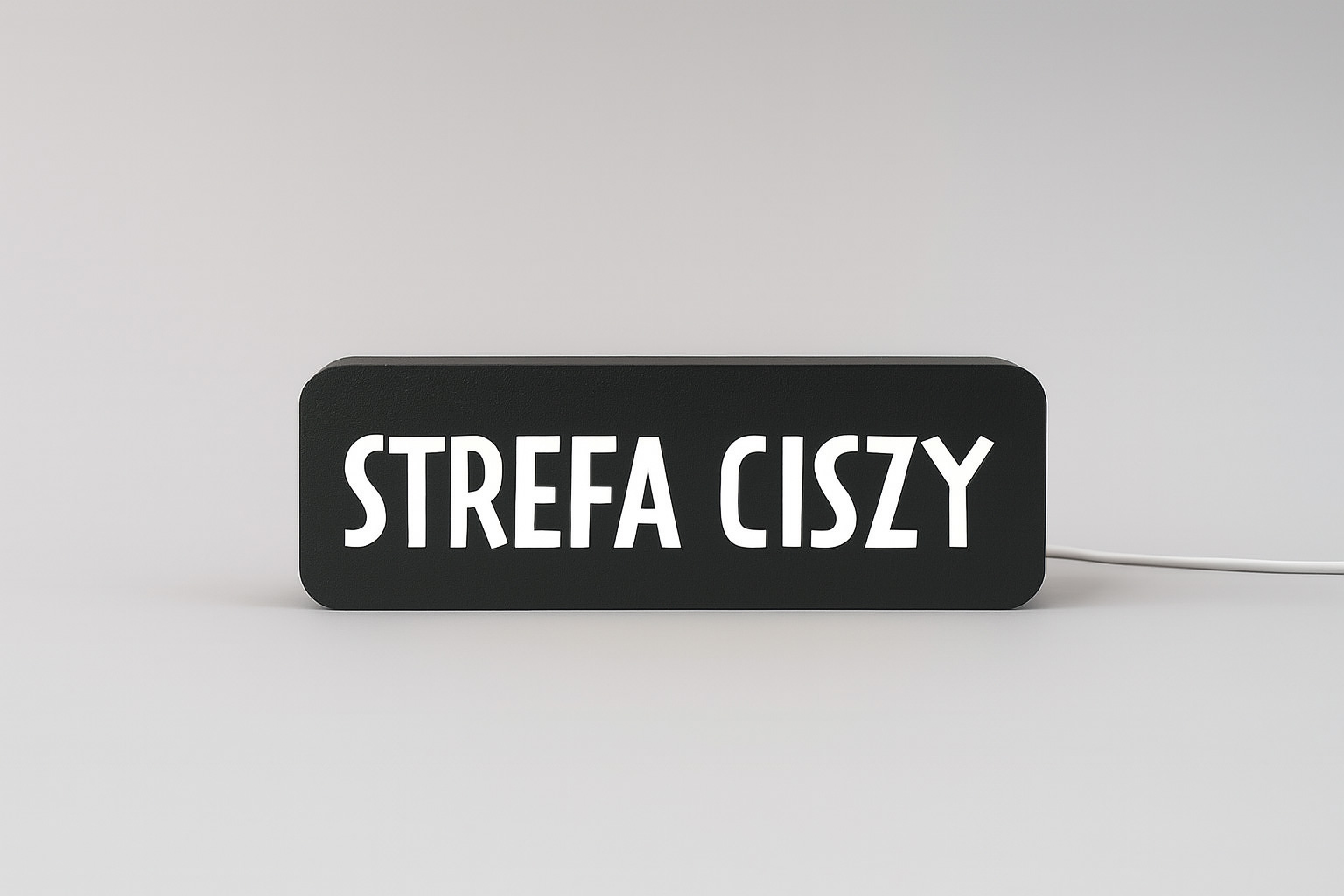 Lampa z napisem STREFA CISZY
